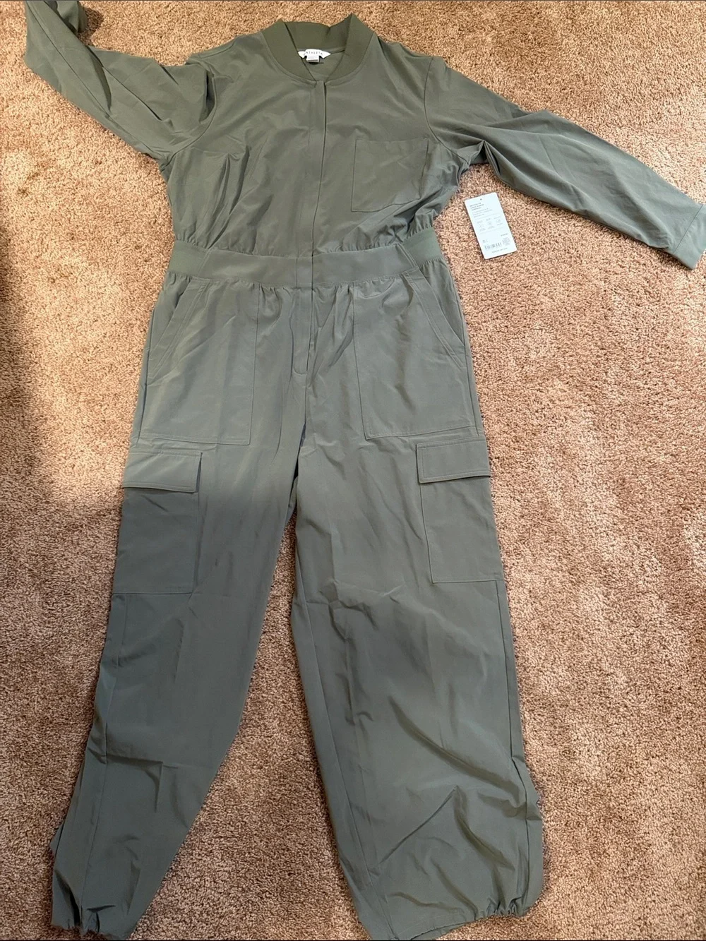 Athleta Brooklyn long sleeve jumpsuit. Size 16 deep green NWT.